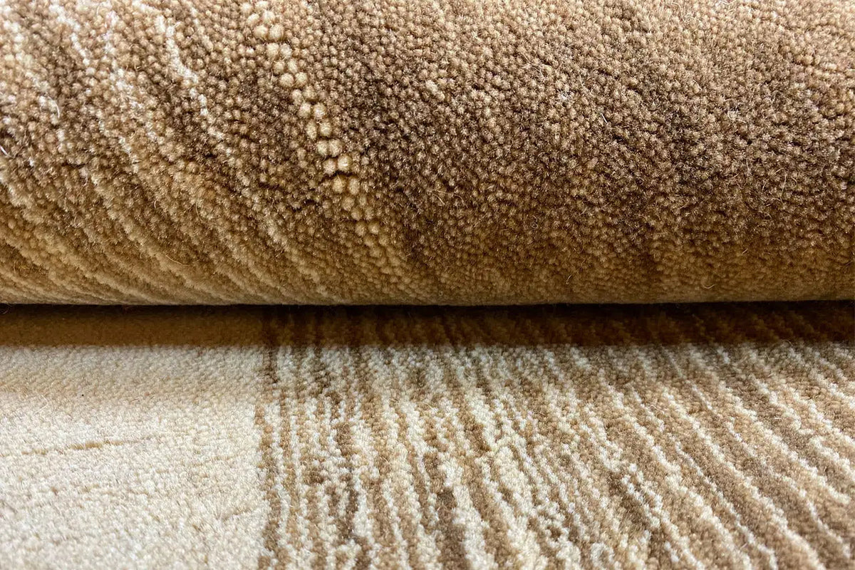 Gabbeh rug close-up, dense pile in light beige and brown, 200x150 cm