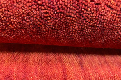 Gabbeh rug, detail of the red pile structure with a fine pattern