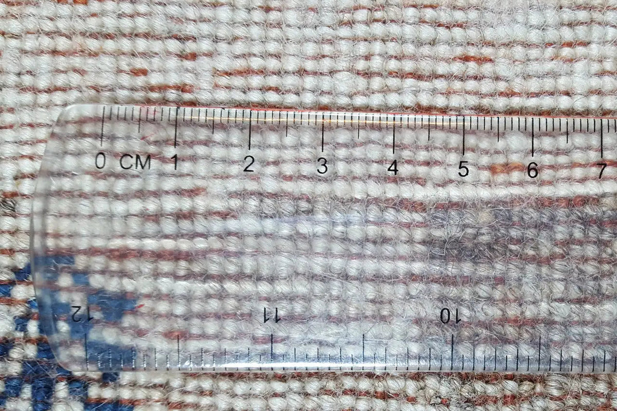 Gabbeh rug: Measure the pile height with a ruler.