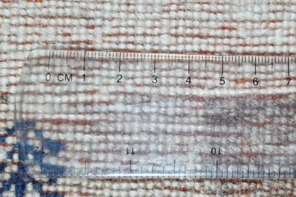 Gabbeh rug: Measure the pile height with a ruler.