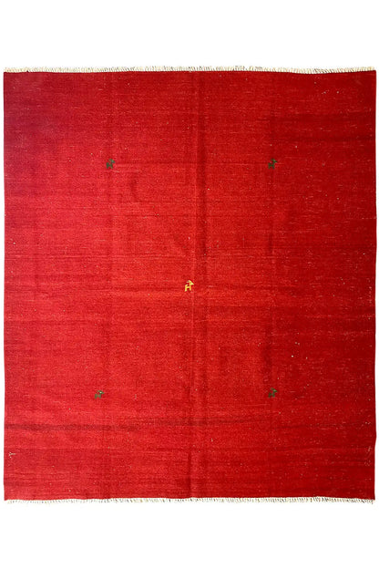 Red Qashqai kilim rug with fine fringes and small pattern accents