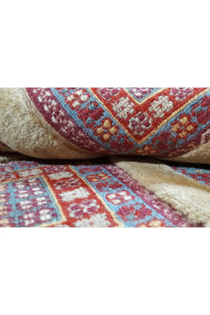Soumak rug: close-up of the woven texture with colored patterned sections