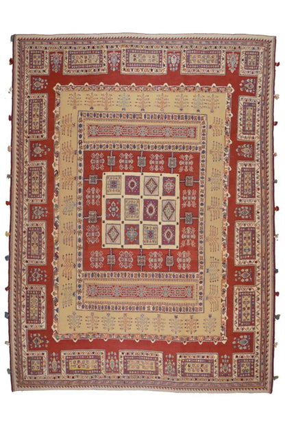 Rug: red background, beige central field, blue patterned border
