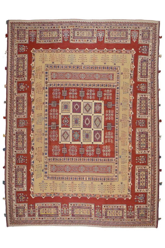 Rug: red background, beige central field, blue patterned border