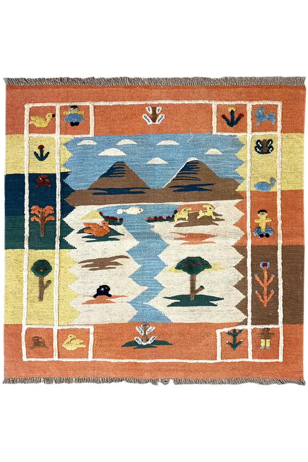 Kilim rug with animal and plant motifs, blue center, orange border, and fringes