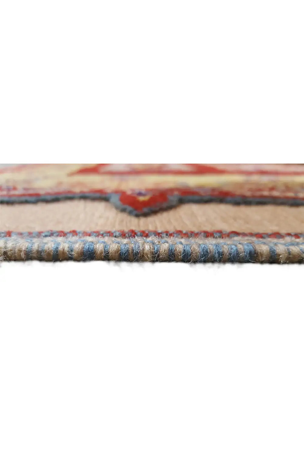 Carpet edge with narrow trim and multicolored fringe