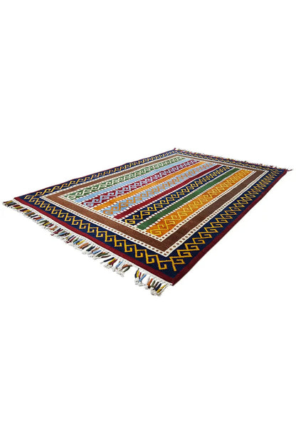 Gabbeh rug “Lori” diagonal view: colorful striped and diamond pattern with fringes
