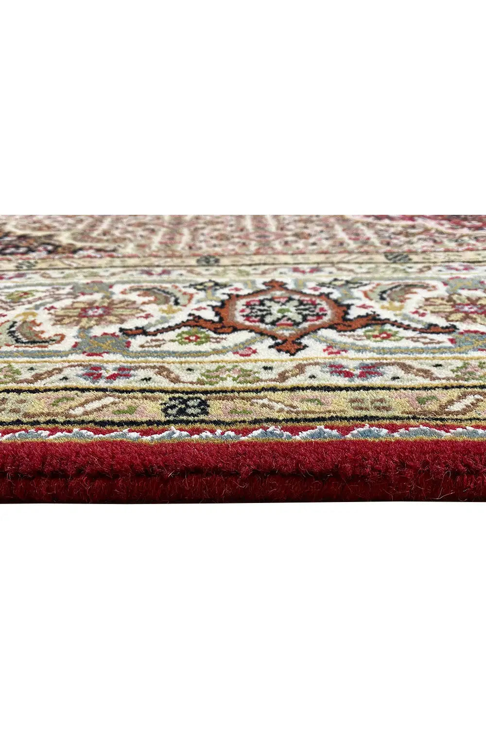 Carpet edge with a decorative border and fine pile texture, multicolored