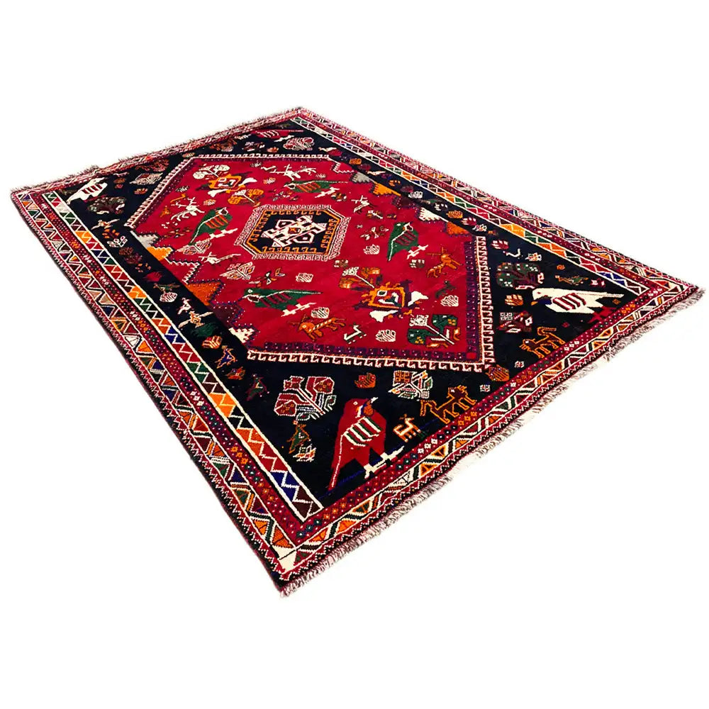 Shiraz rug 255x170 cm, red and black with a framed border and small animal motifs.