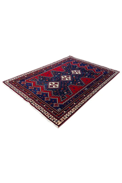 Rug 232x171 cm with a red and blue geometric design and cream-colored border trim