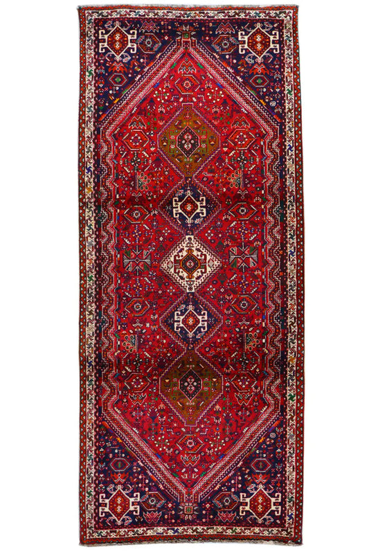 Rectangular runner with a red center and dark blue border ornaments