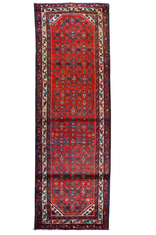 Oriental rug runner, rectangular, red pattern field with blue border
