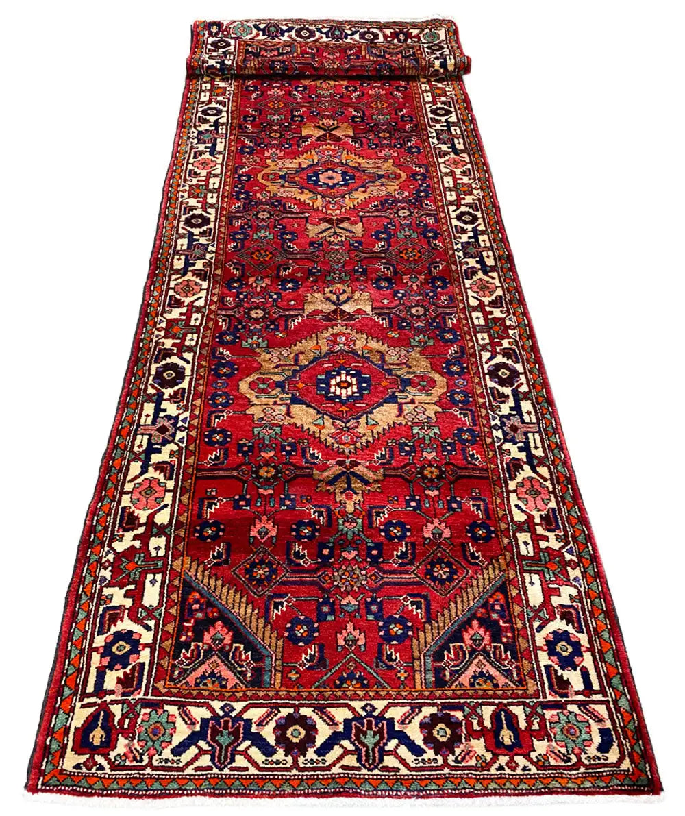 Hamadan runner rug with red medallion and border pattern, blue, beige; 400x111 cm