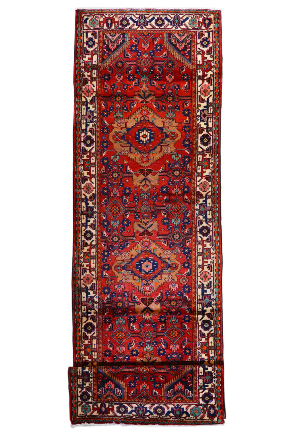 Long Oriental runner: red base pattern, central medallion design and surrounding decorative border