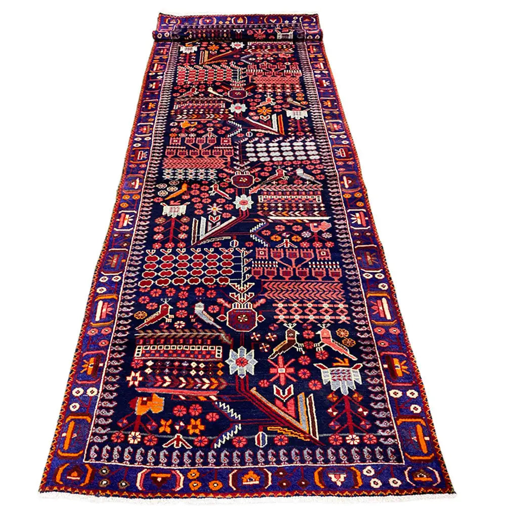 Oriental rug runner with geometric patchwork in blue and red, 379x115 cm