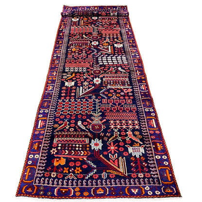 Oriental rug runner with geometric patchwork in blue and red, 379x115 cm