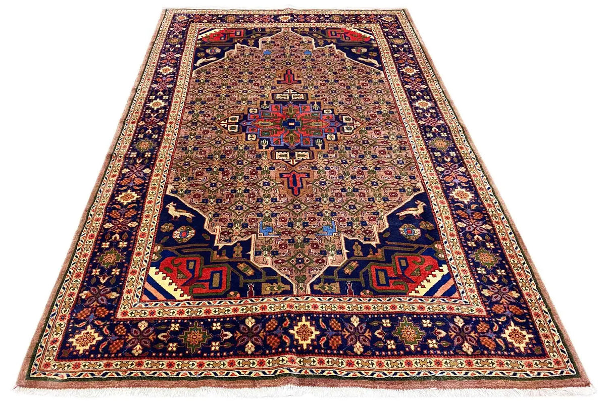 Hamadan rug with a central medallion and floral ornaments, blue and beige