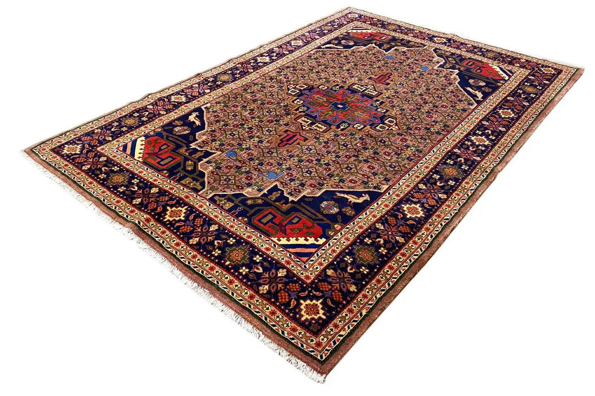 Hamadan rug positioned at an angle, detailed border with blue ornaments