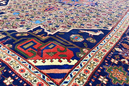 Close-up of a Hamadan rug pattern in blue, red, turquoise and beige
