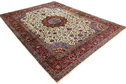 Tabriz Oriental rug, angled view of a cream-colored medallion and red, blue border