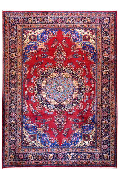 Khorasan rug with a red central medallion, blue border, and intricate ornaments