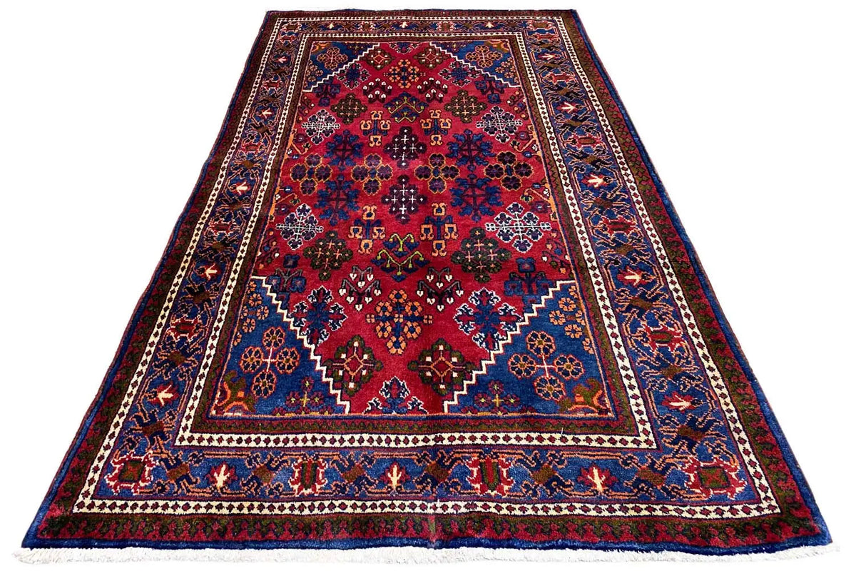 Rectangular Hamadan rug in blue and red with an ornamental border