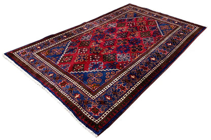 Hamadan rug (blue/red) with a central medallion and fine patterned border