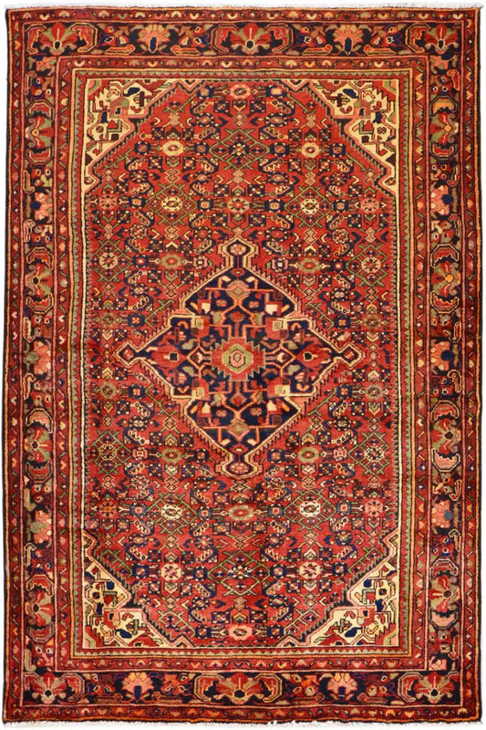 Hamadan rug with a red background and geometric medallion pattern, rectangular