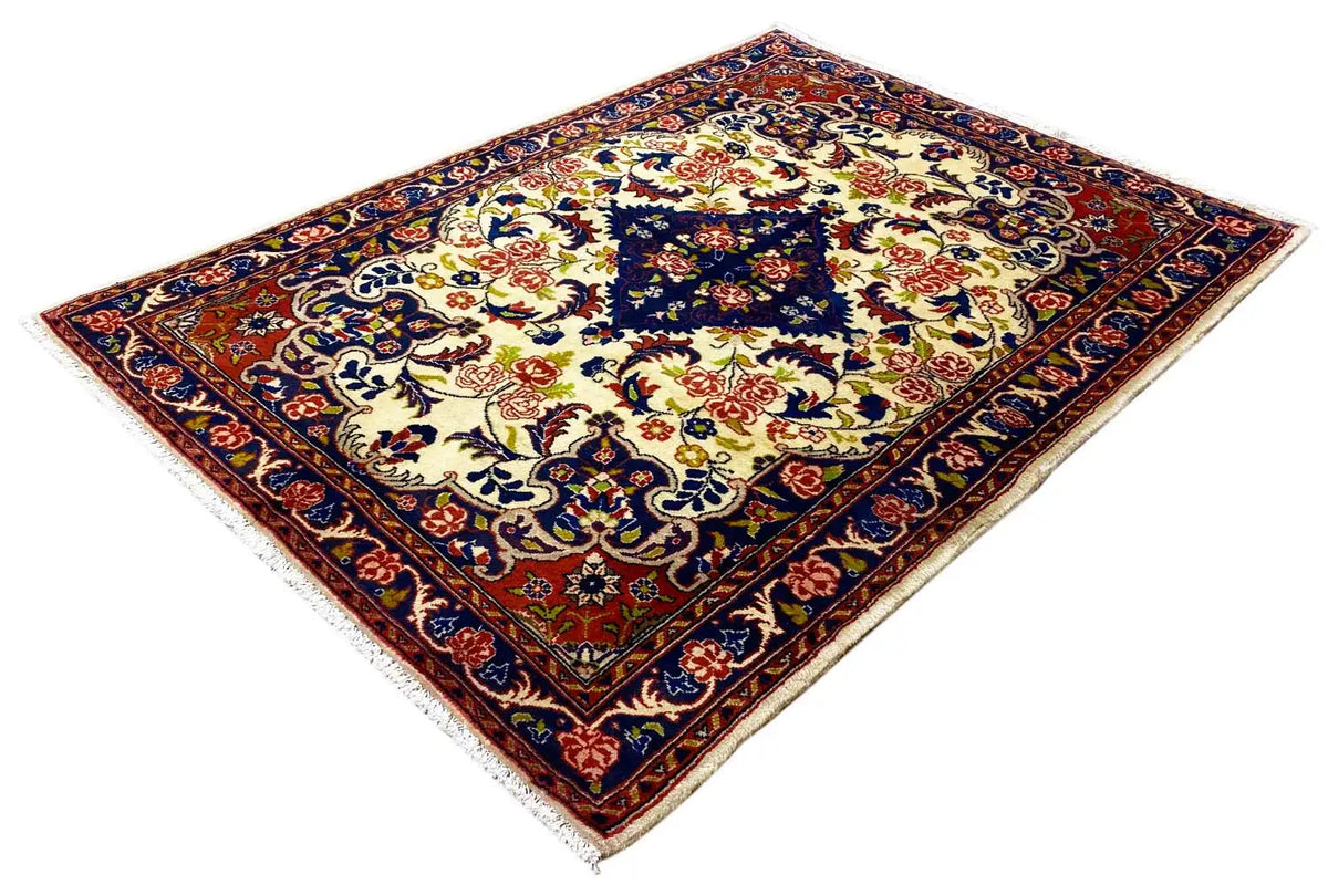 Rug with a square patterned border and central medallion in blue, red, and cream