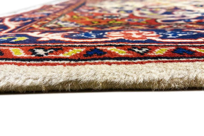 Rug edge with short fringes and a multicolored border design, light background