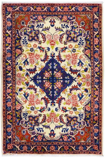 Hamadan rug with an ornamental floral and medallion pattern in blue, red, and cream