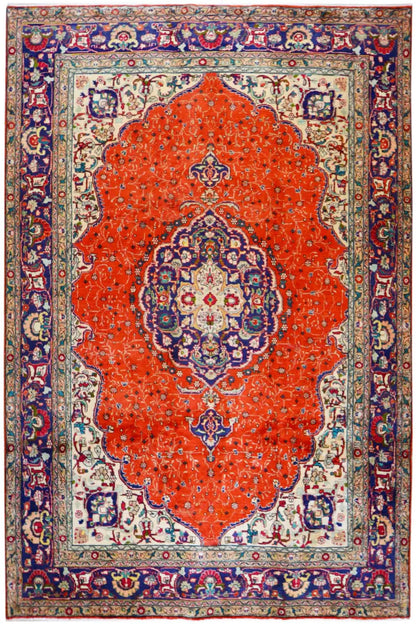 Oriental rug with a red medallion, blue border, and ornamental patterned bands