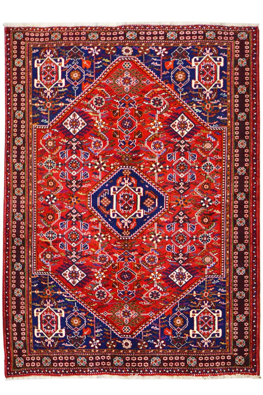 Oriental rug with red and blue pattern and border, rectangular
