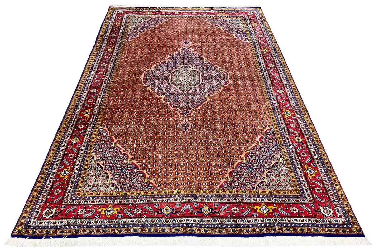 Rectangular Moud rug, reddish background with a central medallion design