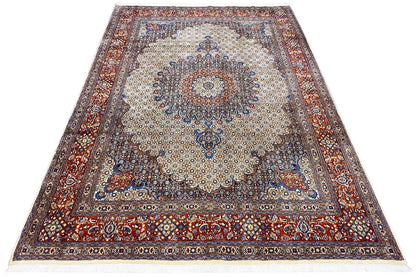 Rug with a beige ground, round medallion, and red-and-blue decorative border