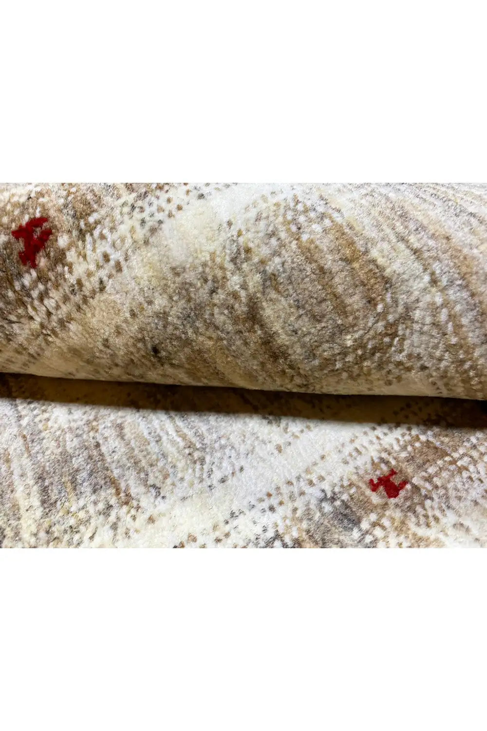 Gabbeh rug (150x102 cm), close-up of the edge with rolled pile and multicolored accents