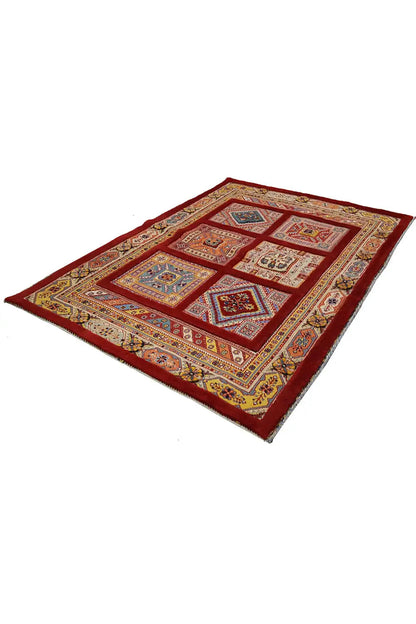 Rug 144x102 cm with a red border and geometric patterned sections