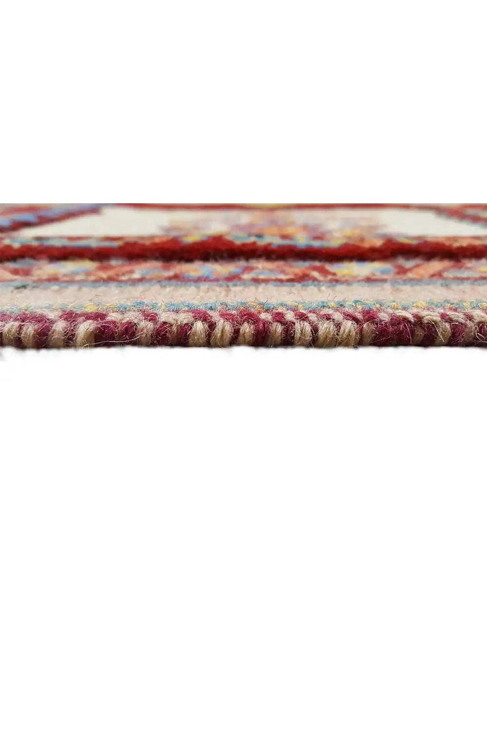 Soumak rug: edge finishing with multicolored trim and fringes