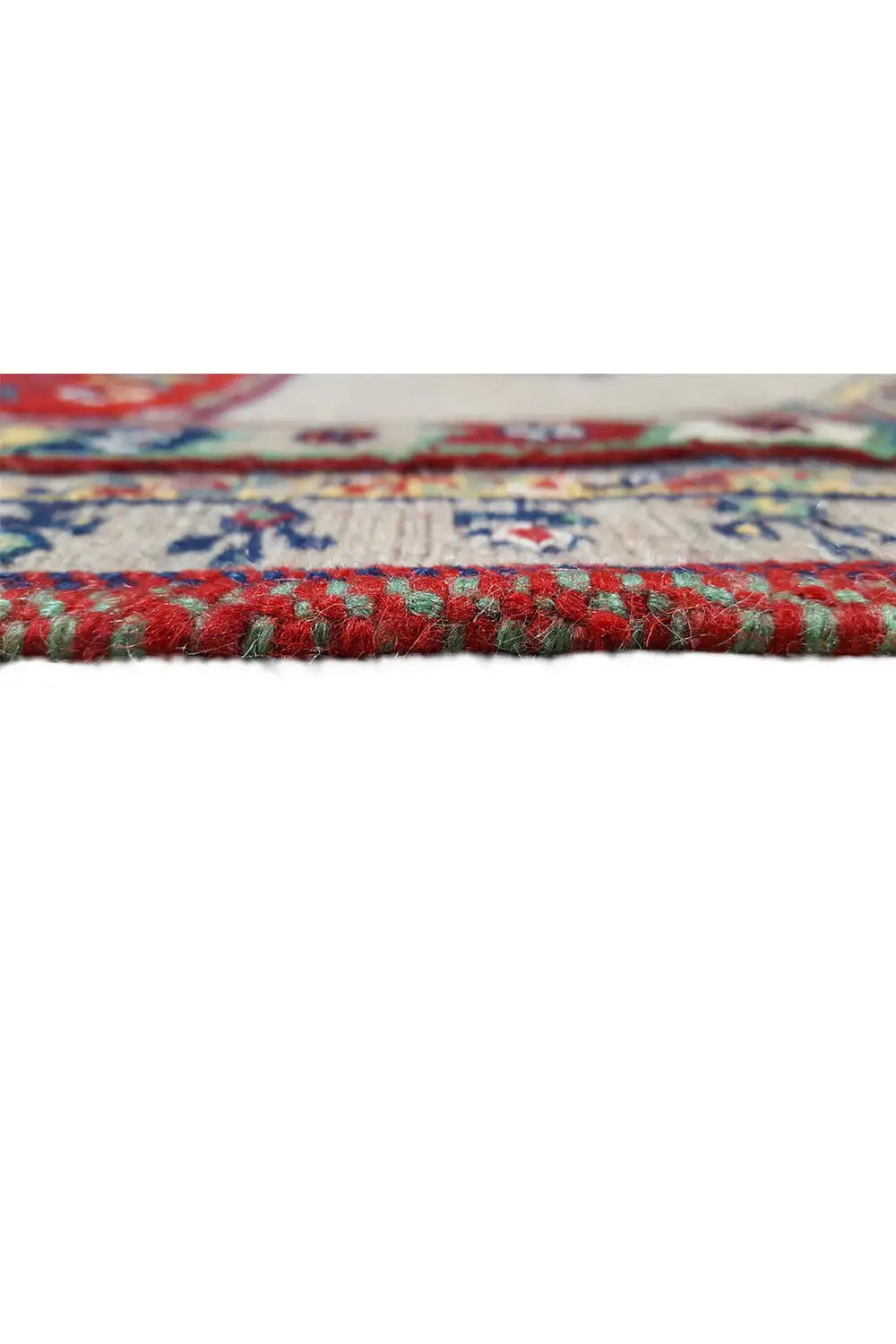 Soumak rug, edge view with a multicolored stripe and dense pile