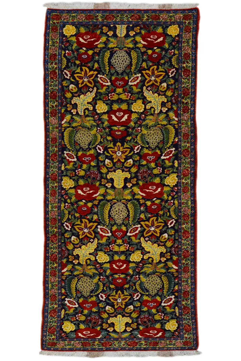 Long-pile rug with a colorful pattern in dark blue, red, yellow, and green