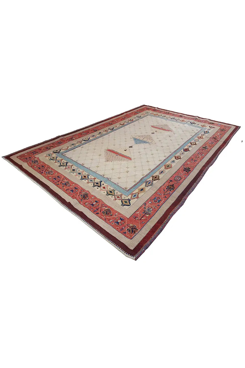 Rug with a red border, blue edge pattern, and beige central motif, folded into a square