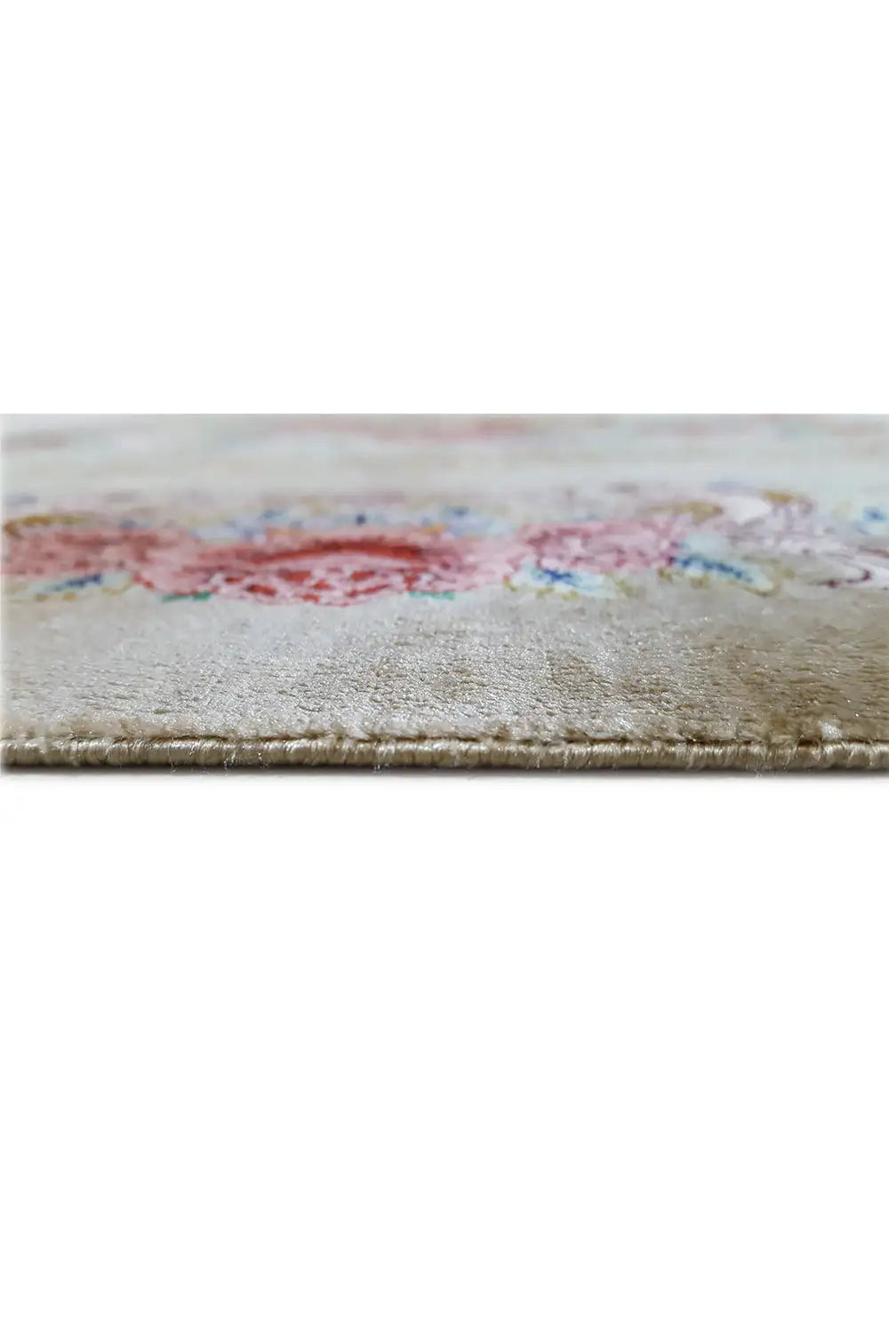 Silk carpet close-up of the selvage with light-colored fringes and a multicolored pattern