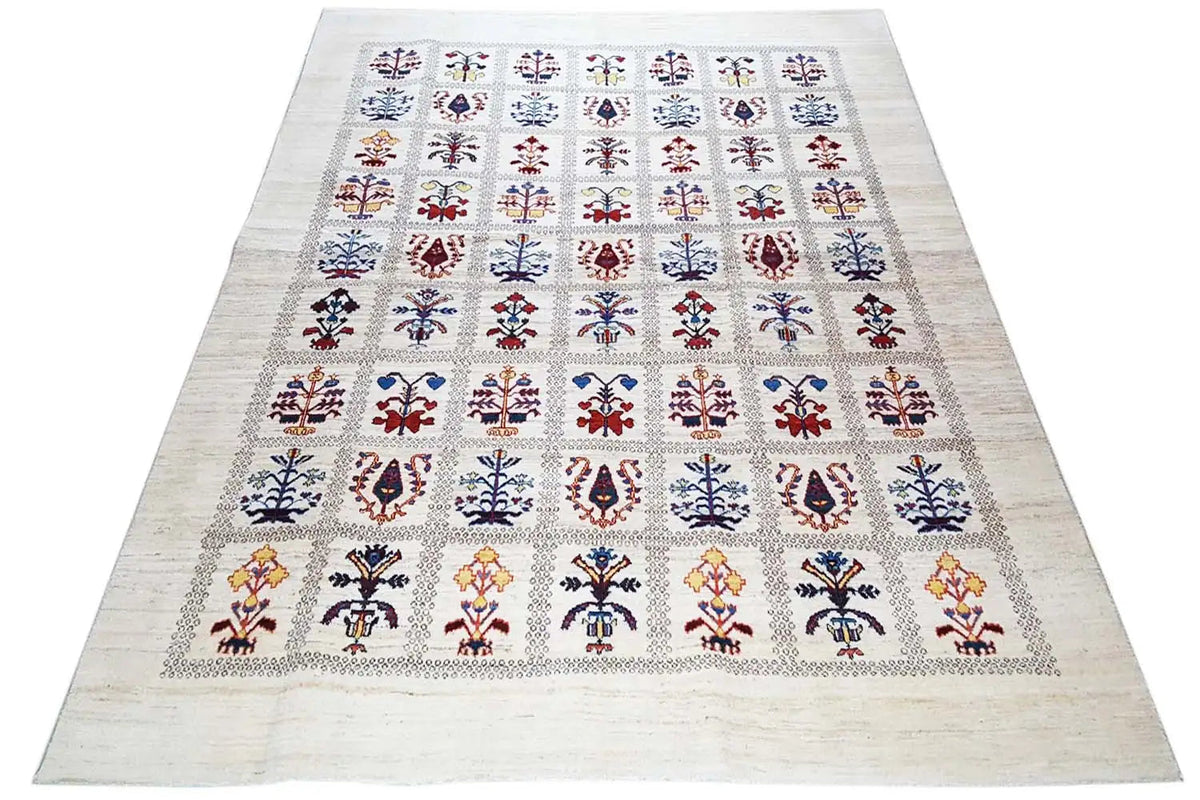 Rectangular Gabbeh-Lori rug on a beige background with colorful small ornaments in a grid.