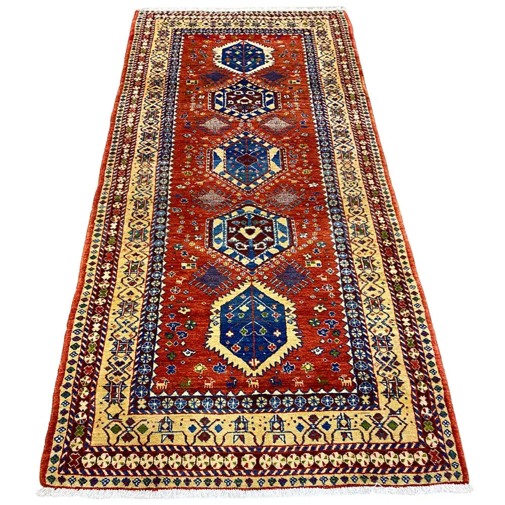 Shiraz rug with three medallions in a vertical format, reddish brown, blue, and cream
