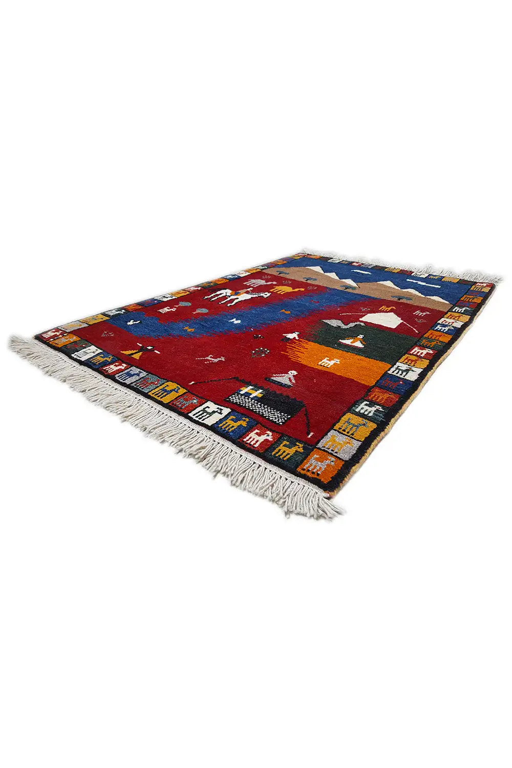 Gabbeh rug with a geometric pattern in blue and red, beige accents, and fringes