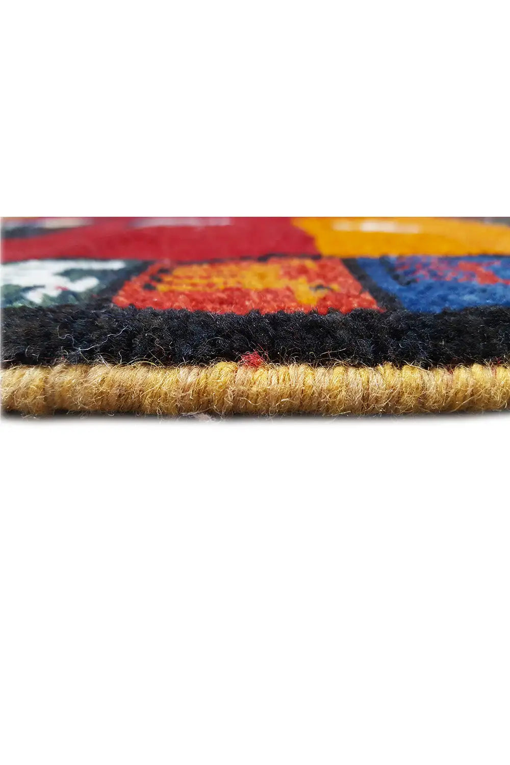 Gabbeh rug detail at the edge: dense pile with a yellow-brown selvage and fringes