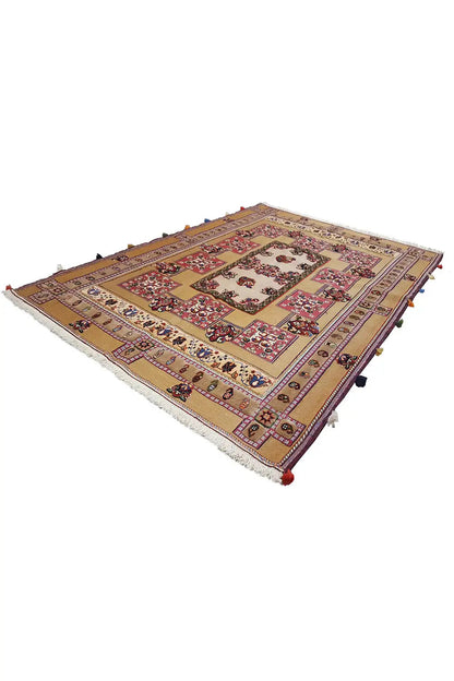 Oriental rug with a border, red field and colorful medallions, corner fringes
