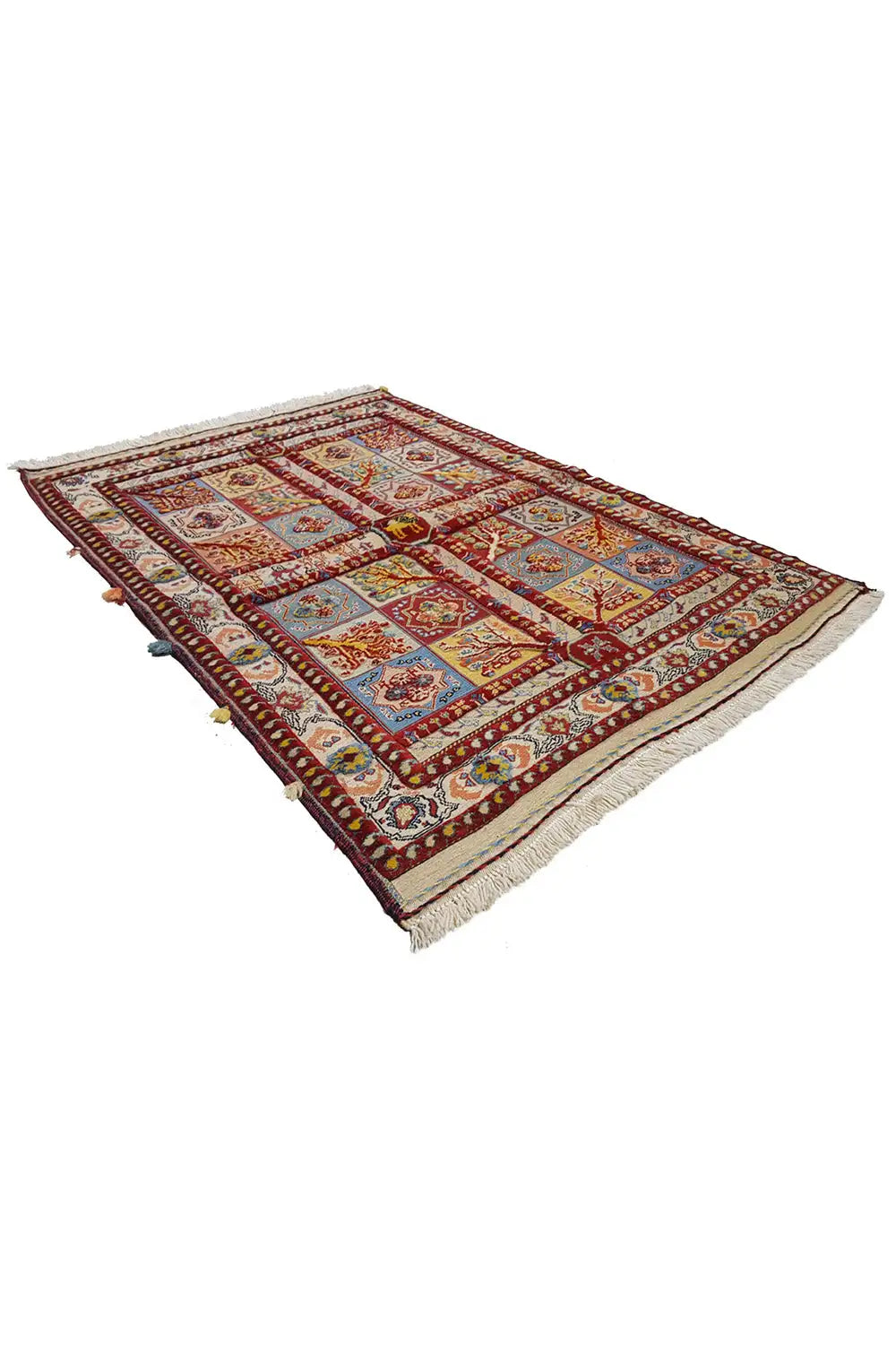 Soumak rug, shown at an angle, multicolored red ornamental pattern, fringes along the edge