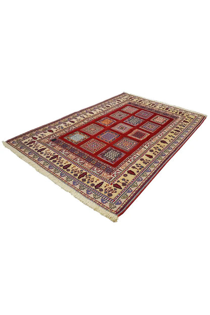Soumak rug 156x101 cm with red central area and diamond pattern, multicolored border.