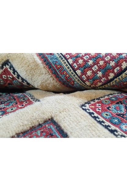 Soumak rug 210x150 cm close-up: beige pile with red and blue patterned sections